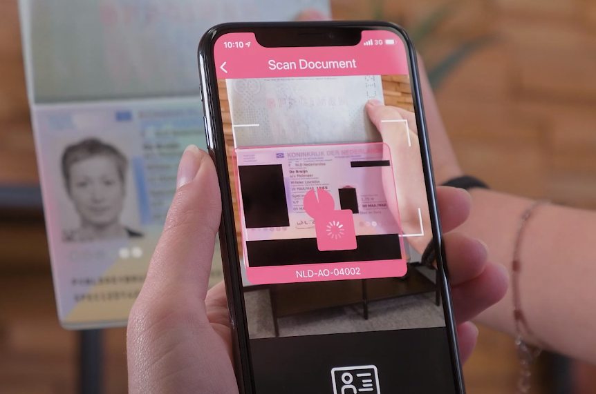Person scanning a passport on a smartphone